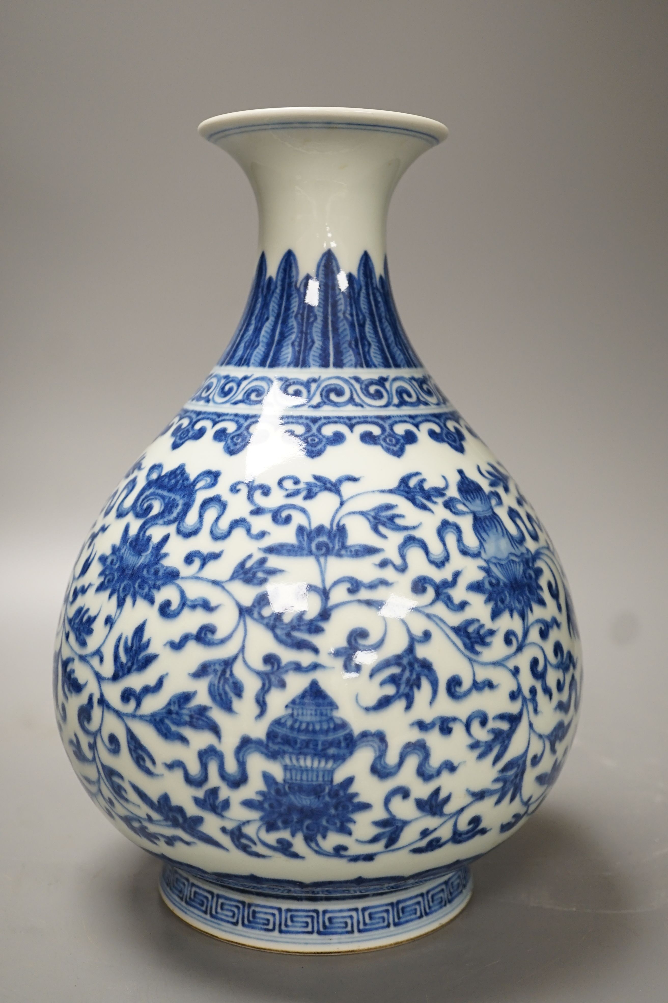 A Chinese blue and white Ming style 'lotus' vase, Yuhuchunping, Qianlong seal mark but 19th century - 28cm high